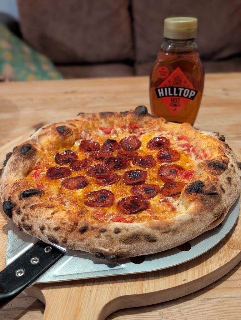 pepperoni pizza with hot honey sauce